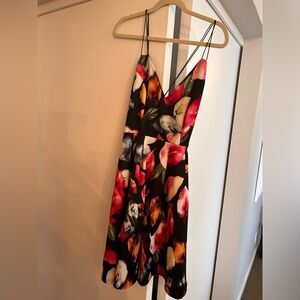 Black dress with floral pattern.